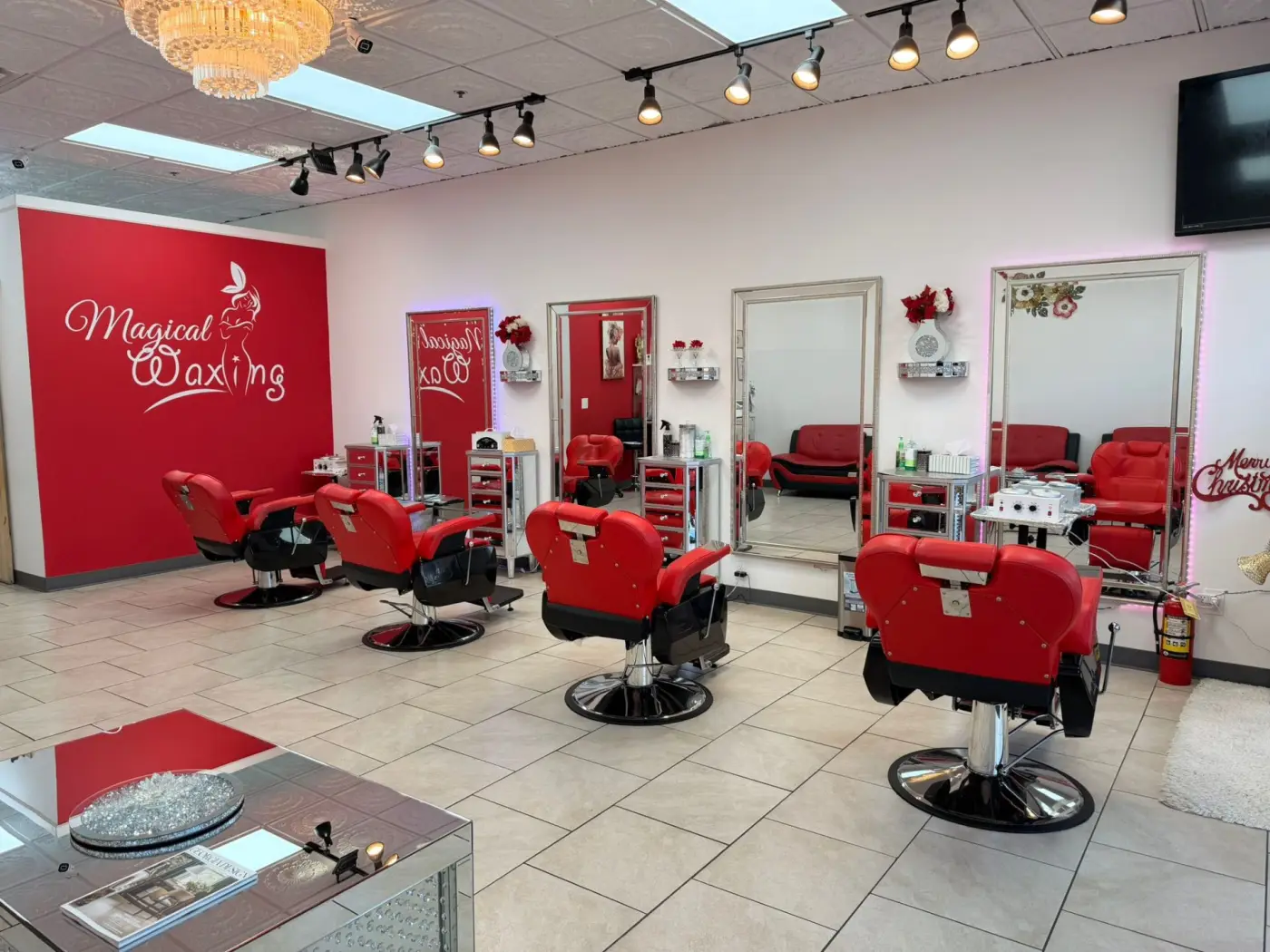 Interior with Magical Waxing® branded wall at a metro Atlanta studio